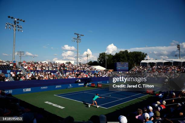 Laslo Djere of Serbia returns a shot from Adrian Mannarino of France during the men's singles championship final on day eight of the Winston-Salem...