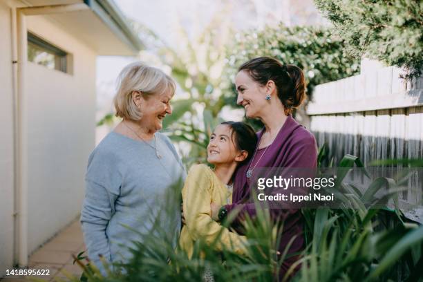 happy three generation family, melbourne, australia - old people australia photos et images de collection