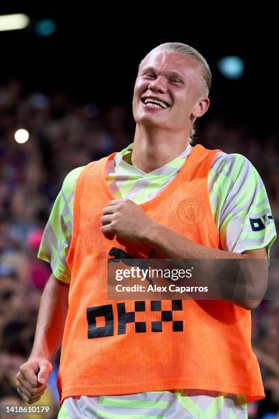 Erling Haaland of Manchester City warms up during the friendly match between FC Barcelona and Manchester City at Spotify Camp Nou on August 24, 2022...