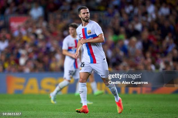 Miralem Pjanic of FC Barcelona looks on during the friendly match between FC Barcelona and Manchester City at Spotify Camp Nou on August 24, 2022 in...