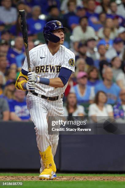 Christian Yelich of the Milwaukee Brewers reacts toa three run home run during the seventh inning against the Chicago Cubs at American Family Field...