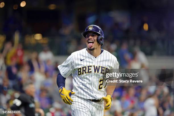 Willy Adames of the Milwaukee Brewers hits a two run home run during the eighth inning against the Chicago Cubs at American Family Field on August...