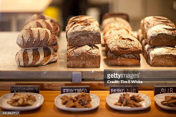 bread display at da matteo's coffeehouse, gothenburg, sweden - göteborg stock pictures, royalty-free photos & images