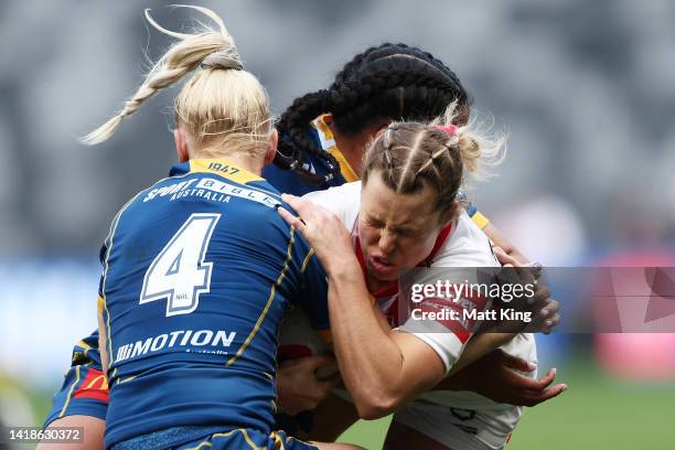 Emma Tonegato of the Dragons is tackled during the round two NRLW match between Parramatta Eels and St George Illawarra Dragons at CommBank Stadium,...