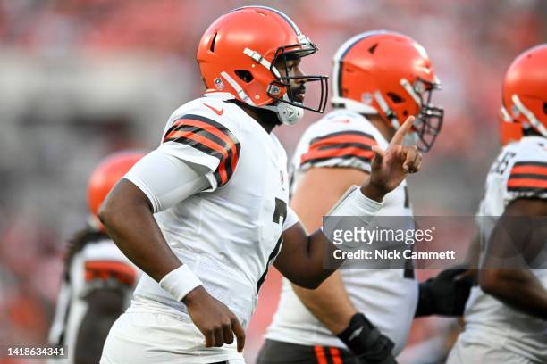 Jacoby Brissett of the Cleveland Browns runs onto the field during the first half of a preseason game against the Chicago Bears at FirstEnergy...