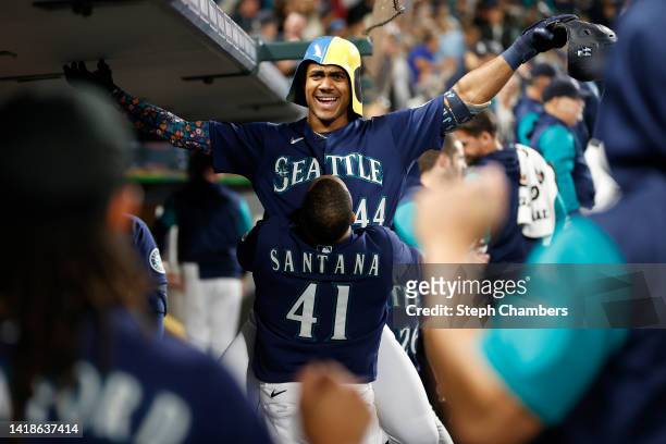 Julio Rodriguez of the Seattle Mariners celebrates his home run during the third inning against the Cleveland Guardians at T-Mobile Park on August...