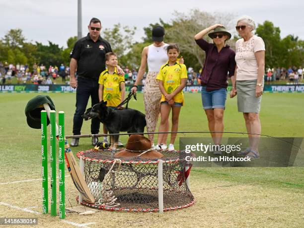 Family and friends of former Australian cricketer Andrew Symonds stand together during a memorial ceremon during game one of the One Day...