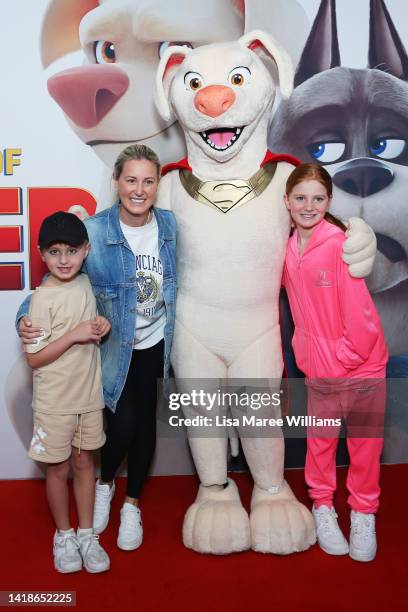 Roxy Jacenko and her son Hunter Curtis and daughter Pixie Curtis pose alongside a film character at the Sydney premiere of "League Of Superpets" on...