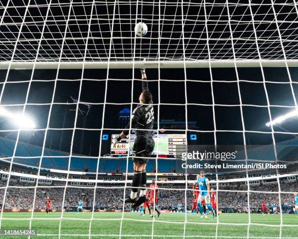 Alex Bono of Toronto FC tips the ball over the cross bar during a game between Toronto FC and Charlotte FC at Bank of America Stadium on August 27,...