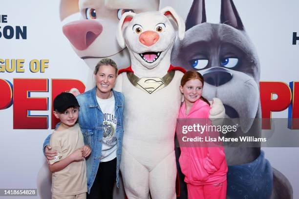 Roxy Jacenko and her son Hunter Curtis and daughter Pixie Curtis pose alongside a film character at the Sydney premiere of "League Of Superpets" on...