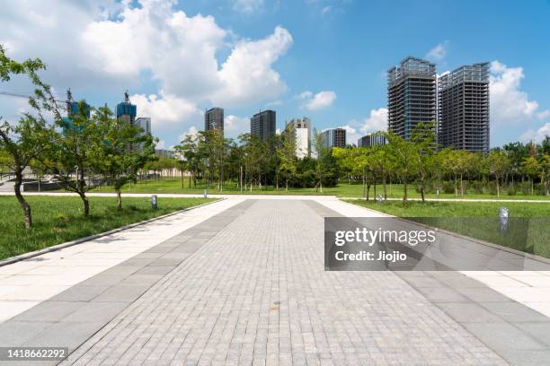 road in the park - acera fotografías e imágenes de stock