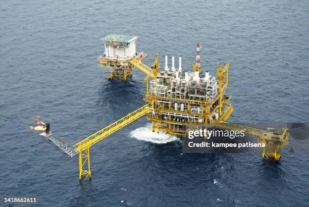 oil and gas drilling rig over offshore platform - oil drill stock pictures, royalty-free photos & images