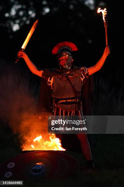 Roman soldier re-enactor poses for pictures following a night attack battle at Chesters Roman Fort on August 27, 2022 in Hexham, United Kingdom. 2022...