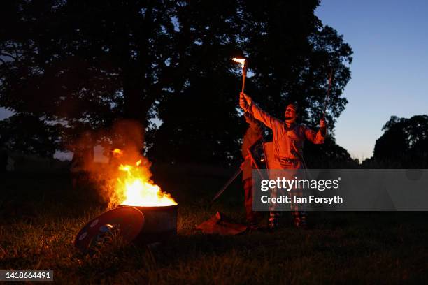 Barbarian re-enactors pose for pictures following a night attack battle at Chesters Roman Fort on August 27, 2022 in Hexham, United Kingdom. 2022 is...