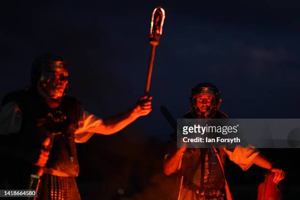 Roman soldier re-enactors pose for pictures following a night attack battle at Chesters Roman Fort on August 27, 2022 in Hexham, United Kingdom. 2022...