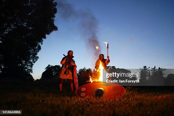 Roman soldier re-enactors pose for pictures following a night attack battle at Chesters Roman Fort on August 27, 2022 in Hexham, United Kingdom. 2022...