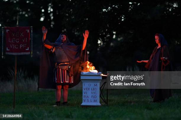 Religious ceremony takes place during a re-enactment of a night attack on a Roman fort at Chesters Roman Fort on August 27, 2022 in Hexham, United...