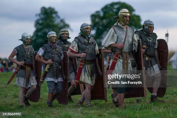 Roman soldier re-enactors demonstrate their drill for the audience at Chesters Roman Fort on August 27, 2022 in Hexham, United Kingdom. 2022 is the...