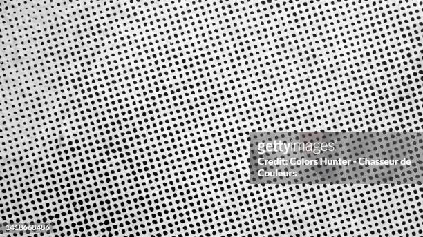 macro photograph of small black dots printed on white paper in paris, france - half tone fotografías e imágenes de stock