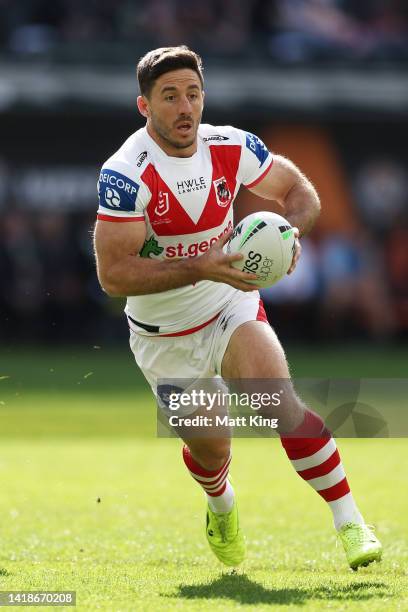 Ben Hunt of the Dragons runs with the ball during the round 24 NRL match between the Wests Tigers and the St George Illawarra Dragons at CommBank...