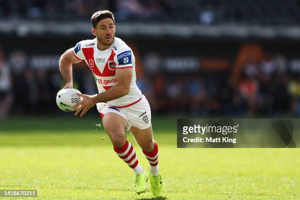 Ben Hunt of the Dragons runs with the ball during the round 24 NRL match between the Wests Tigers and the St George Illawarra Dragons at CommBank...