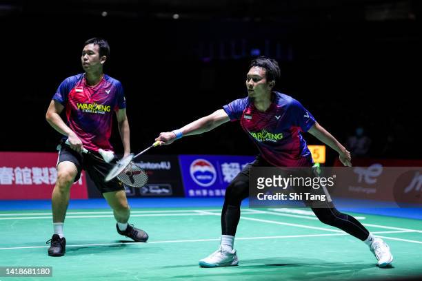 Mohammad Ahsan and Hendra Setiawan of Indonesia compete in the Men's Doubles Final match against Aaron Chia and Soh Wooi Yik of Malaysia on day seven...