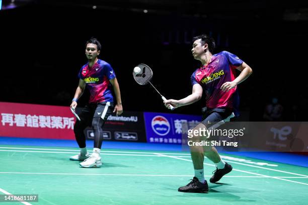 Mohammad Ahsan and Hendra Setiawan of Indonesia compete in the Men's Doubles Final match against Aaron Chia and Soh Wooi Yik of Malaysia on day seven...