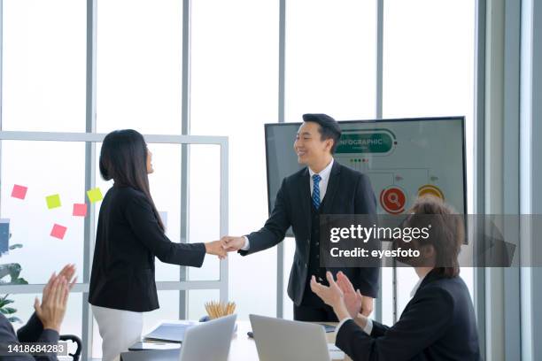 employees are meeting at office. - southeast asia stock pictures, royalty-free photos & images