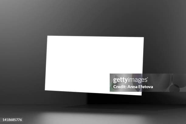 levitating white business card isolated on gray background with shadows. mockup for your design. three dimensional illustration - id card template foto e immagini stock