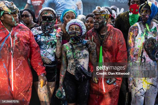 Revellers covered in paint as the opening of the Notting Hill carnival begins with 'J'Ouvert' on August 28, 2022 in London, England. The Notting Hill...