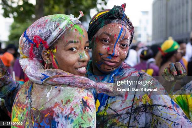 Revellers covered in paint as the opening of the Notting Hill carnival begins with 'J'Ouvert' on August 28, 2022 in London, England. The Notting Hill...