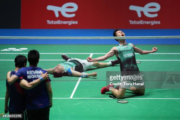 Aaron Chia and Soh Wooi Yik of Malaysia celebrate the victory in the Men's Doubles Final match against Mohammad Ahsan and Hendra Setiawan of...