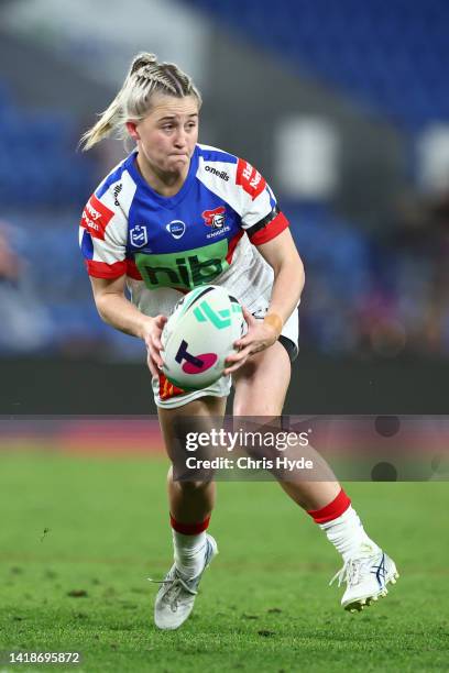 Emma Manzelmann of the Knights runs the ball during the round two NRLW match between Gold Coast Titans and Newcastle Knights at Cbus Super Stadium,...