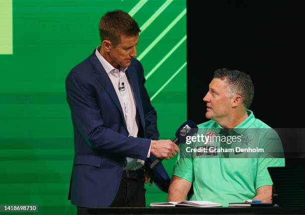 Mark Howard speaks to David Hussey of the Stars during the 2022 Big Bash League Draft at NEP Studios on August 28, 2022 in Melbourne, Australia.