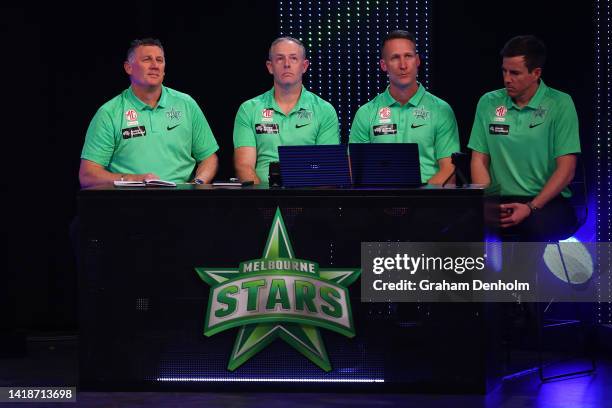 David Hussey, Ben Rohrer, Blair Crouch and Chris MacDonald of the Stars look on during the 2022 Big Bash League Draft at NEP Studios on August 28,...