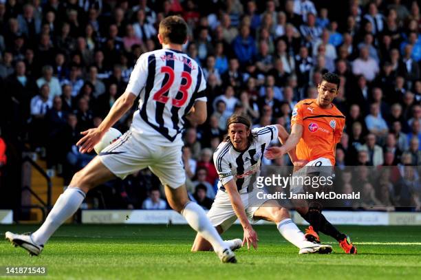 Hatem Ben Arfa of Newcastle scores his team's second goal during the Barclays Premier League match between West Bromwich Albion and Newcastle United...