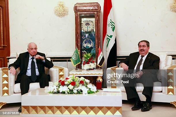 Iraqi Foreign Minister Hoshyar Zebari, right, meets with Arab League Secretary General Nabil Elaraby, left, March 25, 2012 in Baghdad, Iraq. Elaraby...