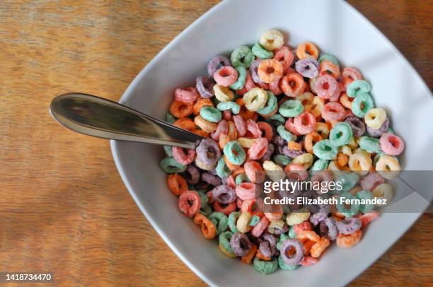 bowl of colorful loops cereals - bowl of cereal ストックフォトと画像
