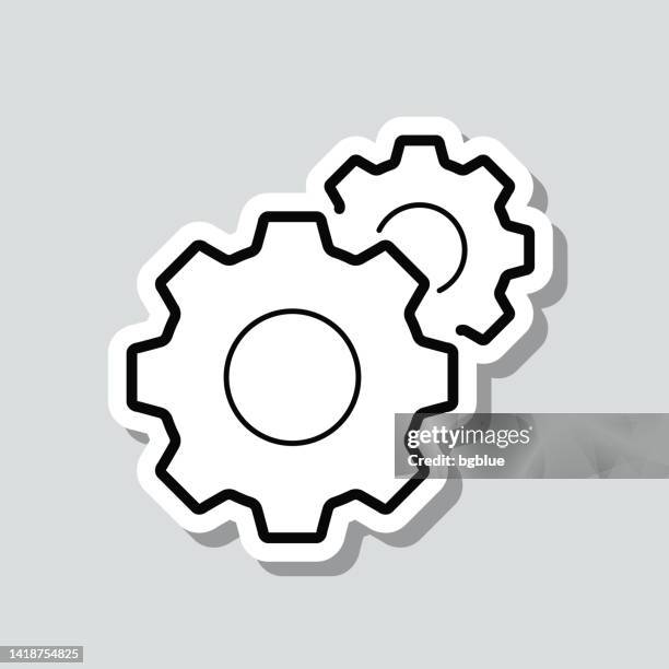 settings - gears. icon sticker on gray background - spinning wheel stock illustrations