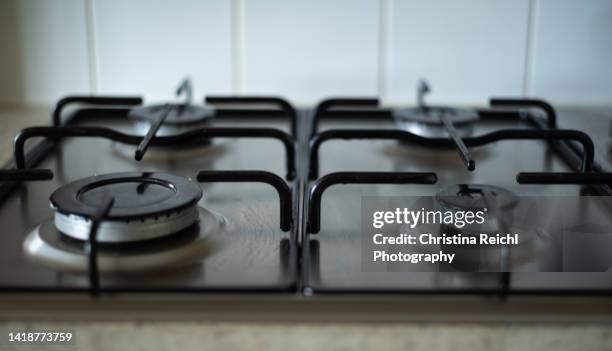 close up of gas burner - burns stock pictures, royalty-free photos & images