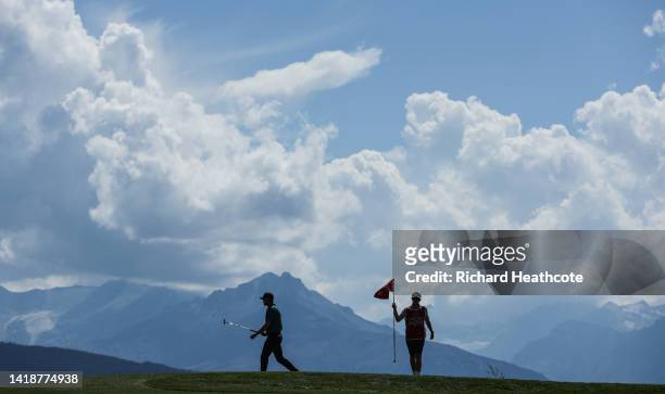 Richard Mansell of England with his caddy on the 7th green during Day Four of the Omega European Masters at Crans-sur-Sierre Golf Club on August 28,...