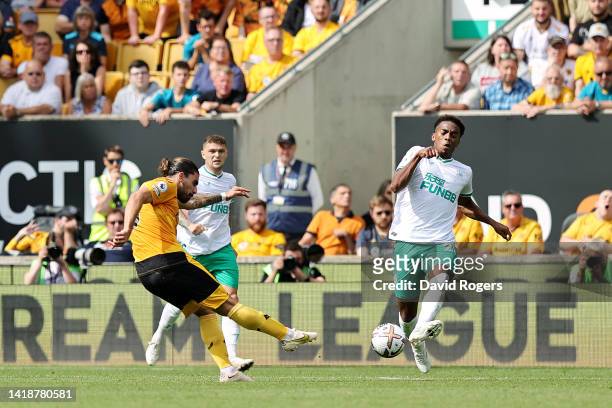 Ruben Neves of Wolverhampton Wanderers scores their team's first goal during the Premier League match between Wolverhampton Wanderers and Newcastle...