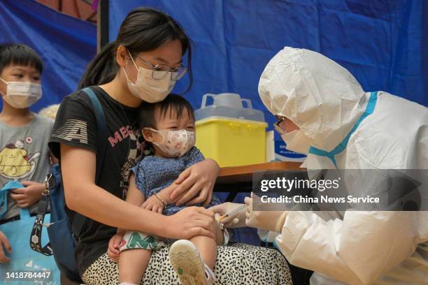 Child receives COVID-19 vaccine at a community center on August 28, 2022 in Hong Kong, China.
