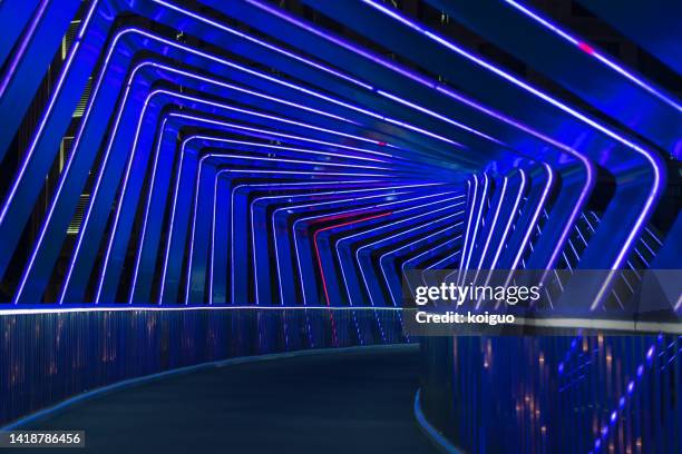 pedestrian bridge lighting effect at night - illuminated bridge stock pictures, royalty-free photos & images