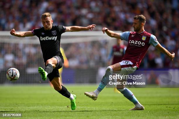 Calum Chambers of Aston Villa battles for possession with Jarrod Bowen of West Ham United during the Premier League match between Aston Villa and...