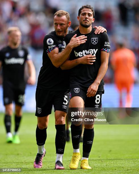 Vladimir Coufal of West Ham United celebrates with teammate Pablo Fornals after victory in the Premier League match between Aston Villa and West Ham...