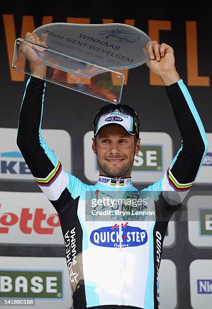 Tom Boonen of Belgium and Omega Pharma-Quick Step celebrates winning the 74th edition of the Gent - Wevelgem one day cycle race on March 25, 2012 in...