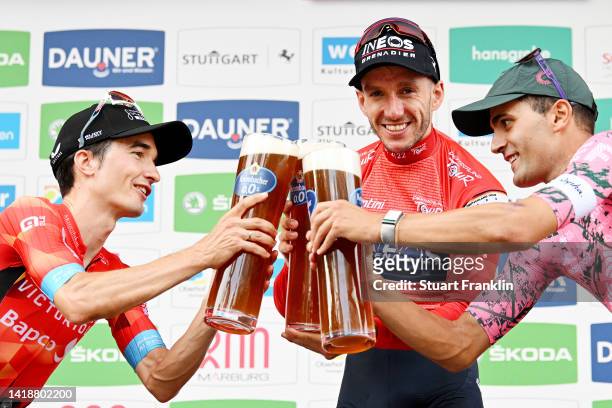 Pello Bilbao López of Spain and Team Bahrain Victorious on second place, race winner Adam Yates of United Kingdom and Team INEOS Grenadiers - Red...