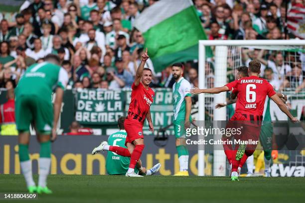 Mario Goetze of Eintracht Frankfurt celebrates after scoring their side's first goal during the Bundesliga match between SV Werder Bremen and...