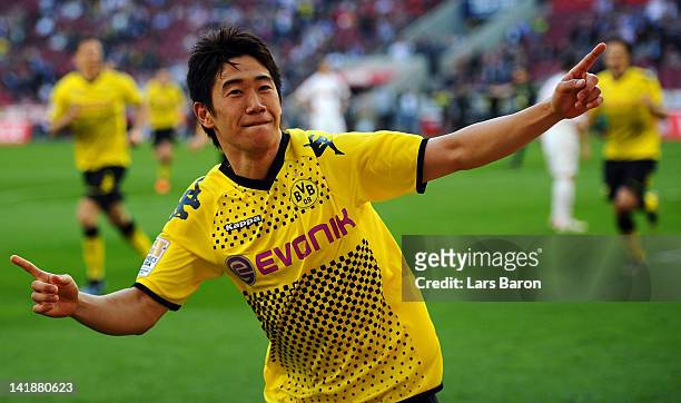 Shinji Kagawa of Dortmund celebrates after scoring his teams second goal during the Bundesliga match between 1. FC Koeln and Borussia Dortmund at...
